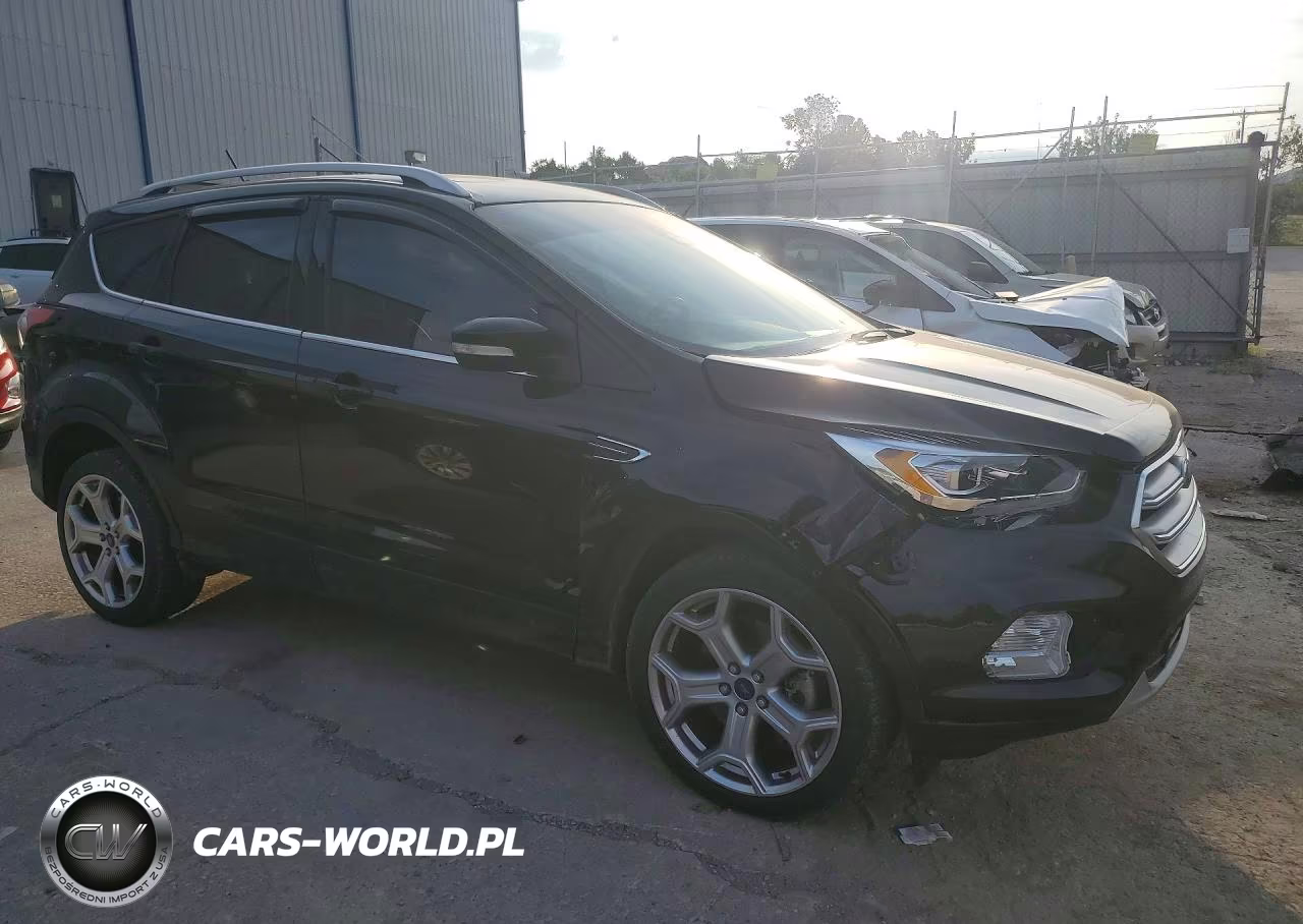 2018 Ford Escape Titanium VIN:1FMCU9J90JUA03134 - 4