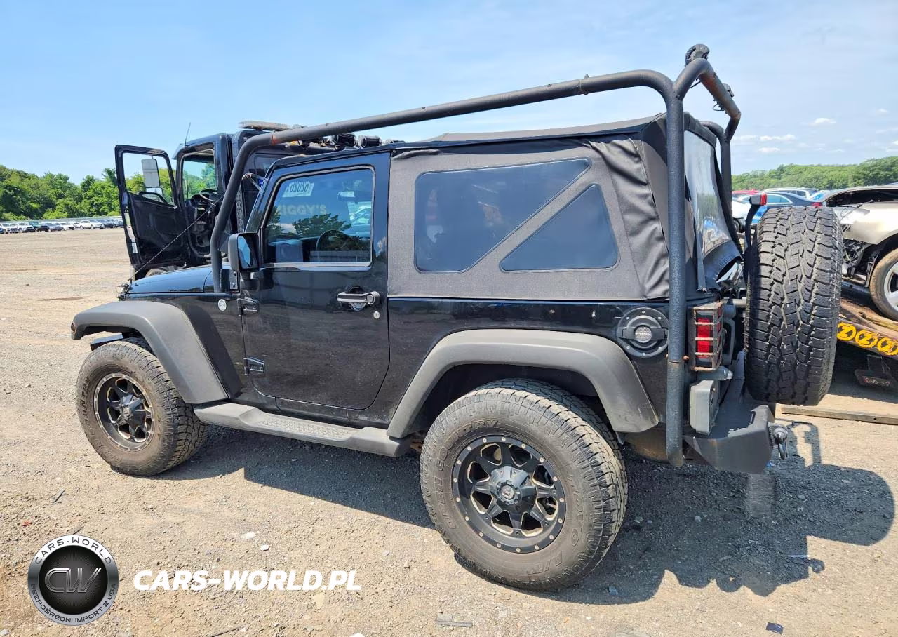 2012 Jeep Wrangler Sport VIN:1C4GJWAG2CL105328 - 2