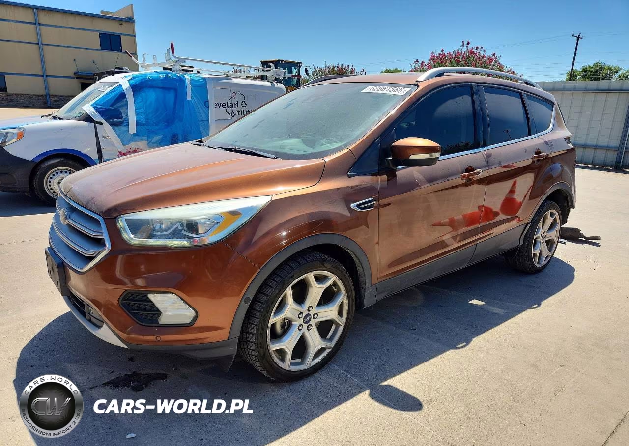 2017 Ford Escape Titanium VIN:1FMCU0J93HUB01676 - 1