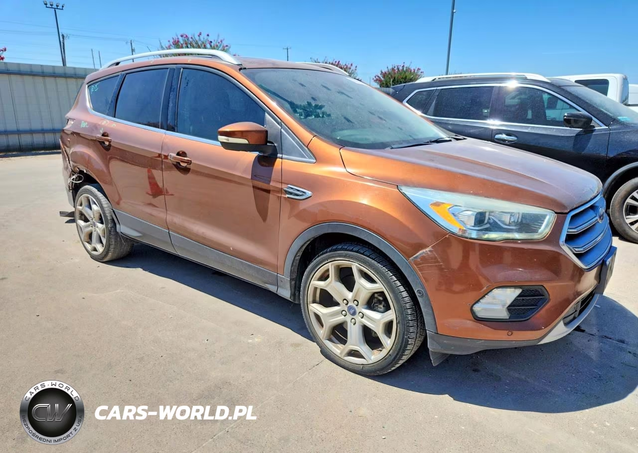 2017 Ford Escape Titanium VIN:1FMCU0J93HUB01676 - 4