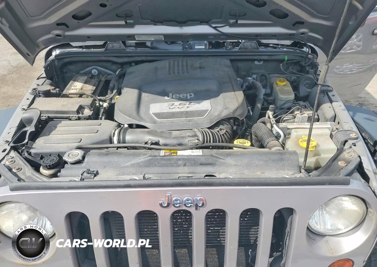 2013 Jeep Wrangler Unlimited Sport VIN:1C4BJWDG7DL669547 - 12