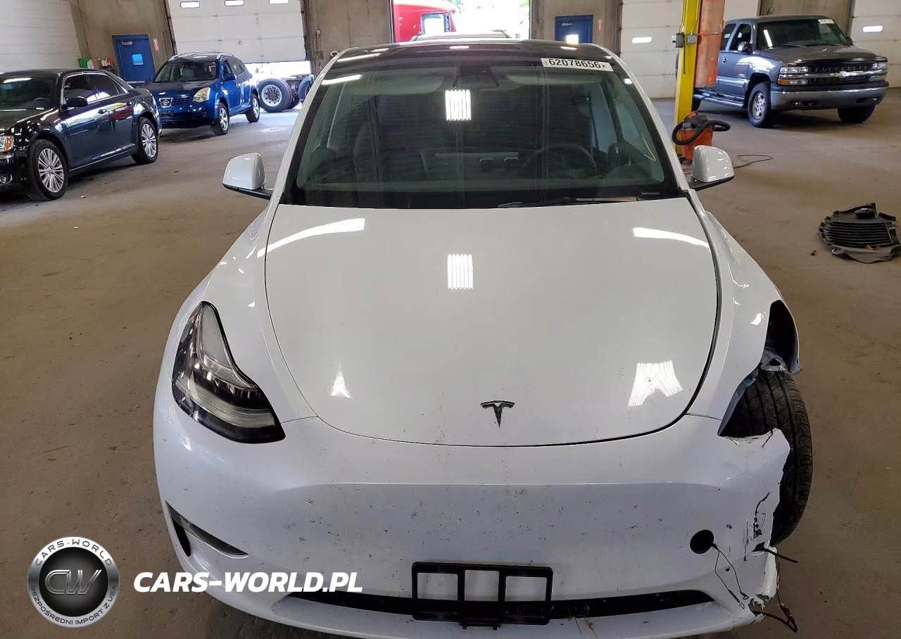 2023 Tesla Model Y VIN:7SAYGDEE6PA076103 - 5