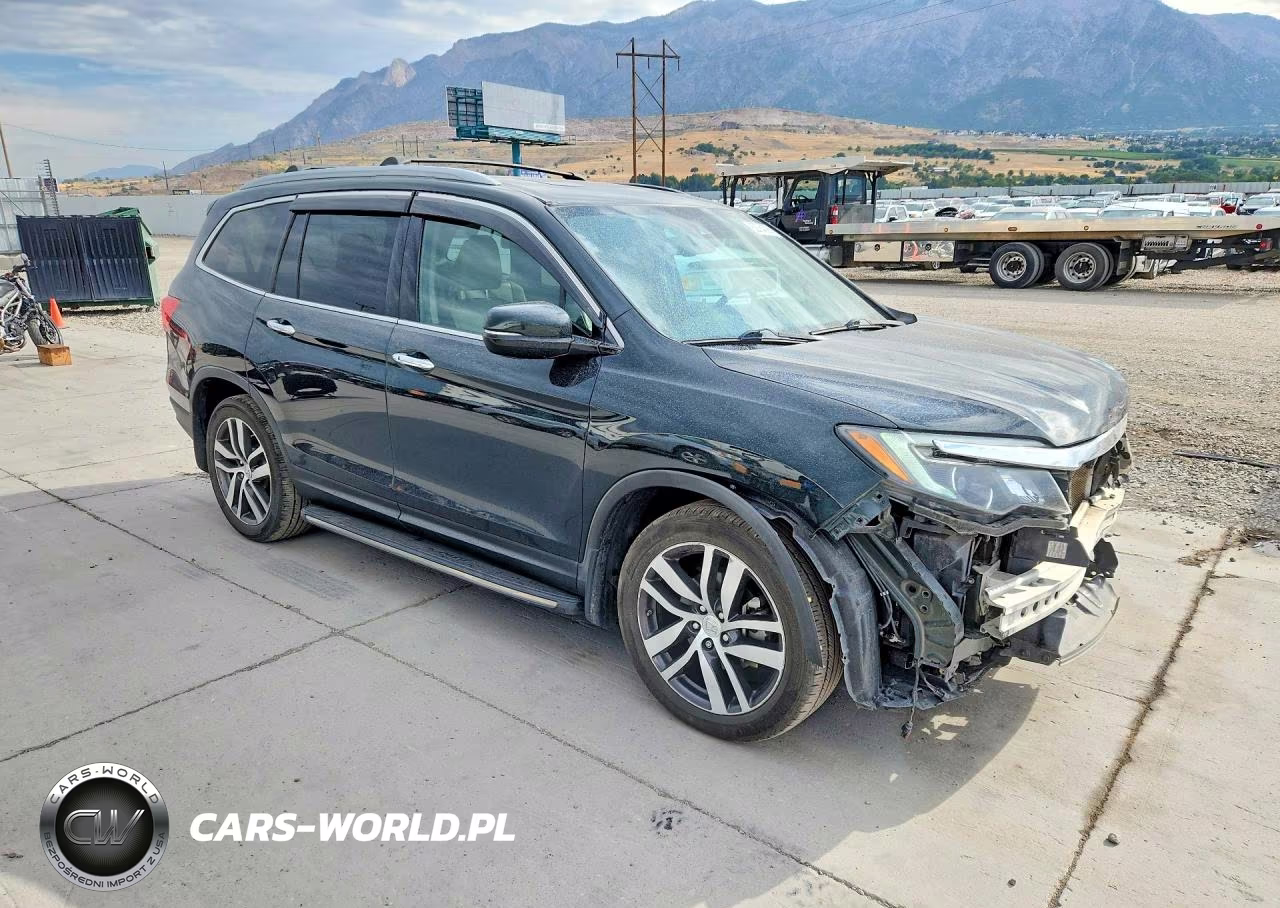 2016 Honda Pilot Elite VIN:5FNYF6H01GB066674 - 4
