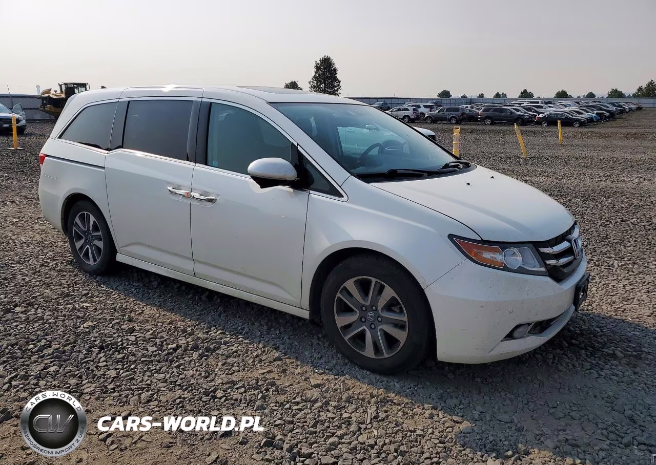 2016 Honda Odyssey Touring VIN:5FNRL5H97GB016996 - 4