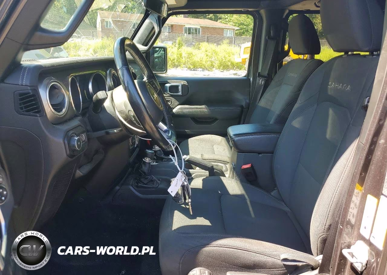 2019 Jeep Wrangler Unlimited Sahara VIN:1C4HJXEN9KW667825 - 7