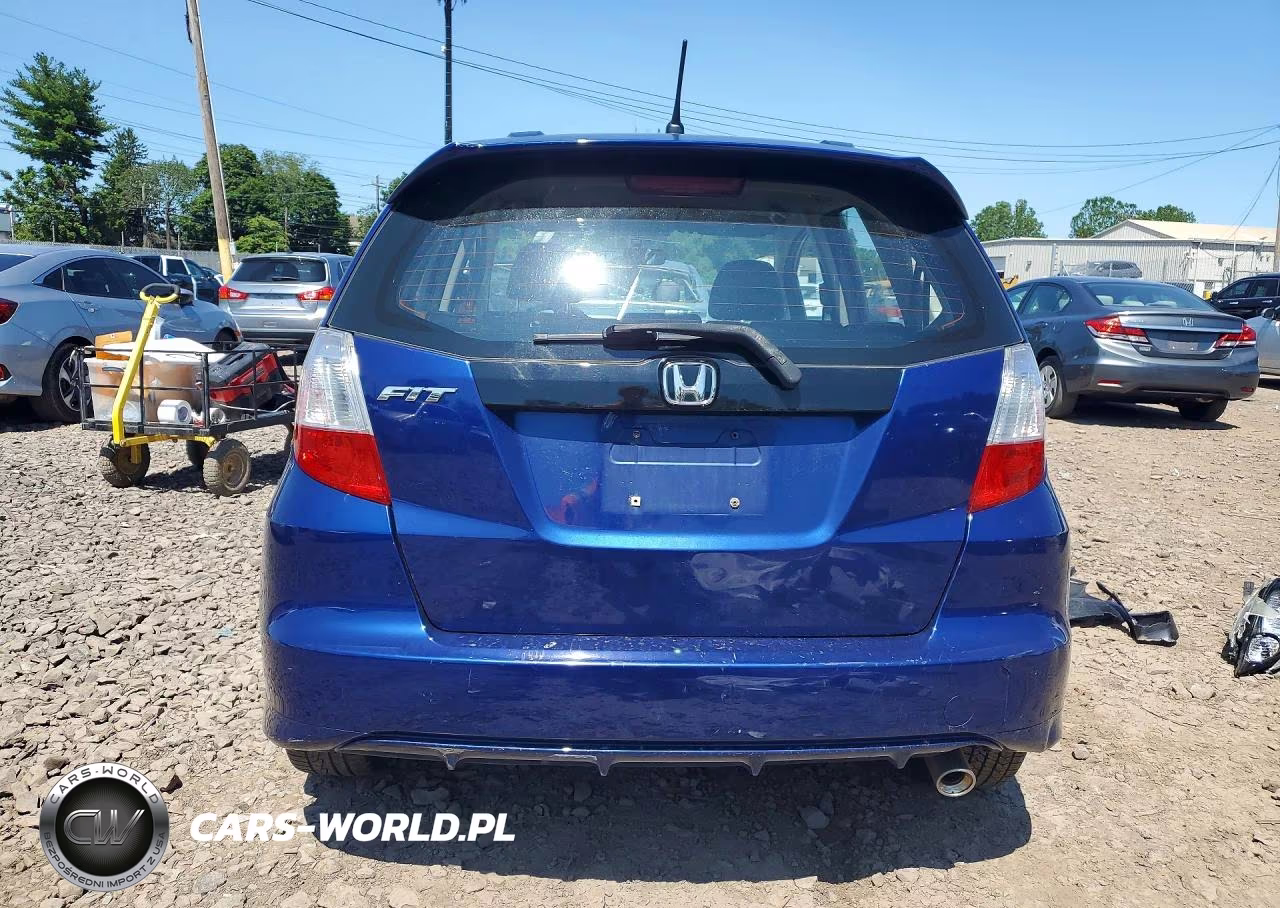 2013 Honda Fit Sport VIN:JHMGE8H55DC072653 - 6