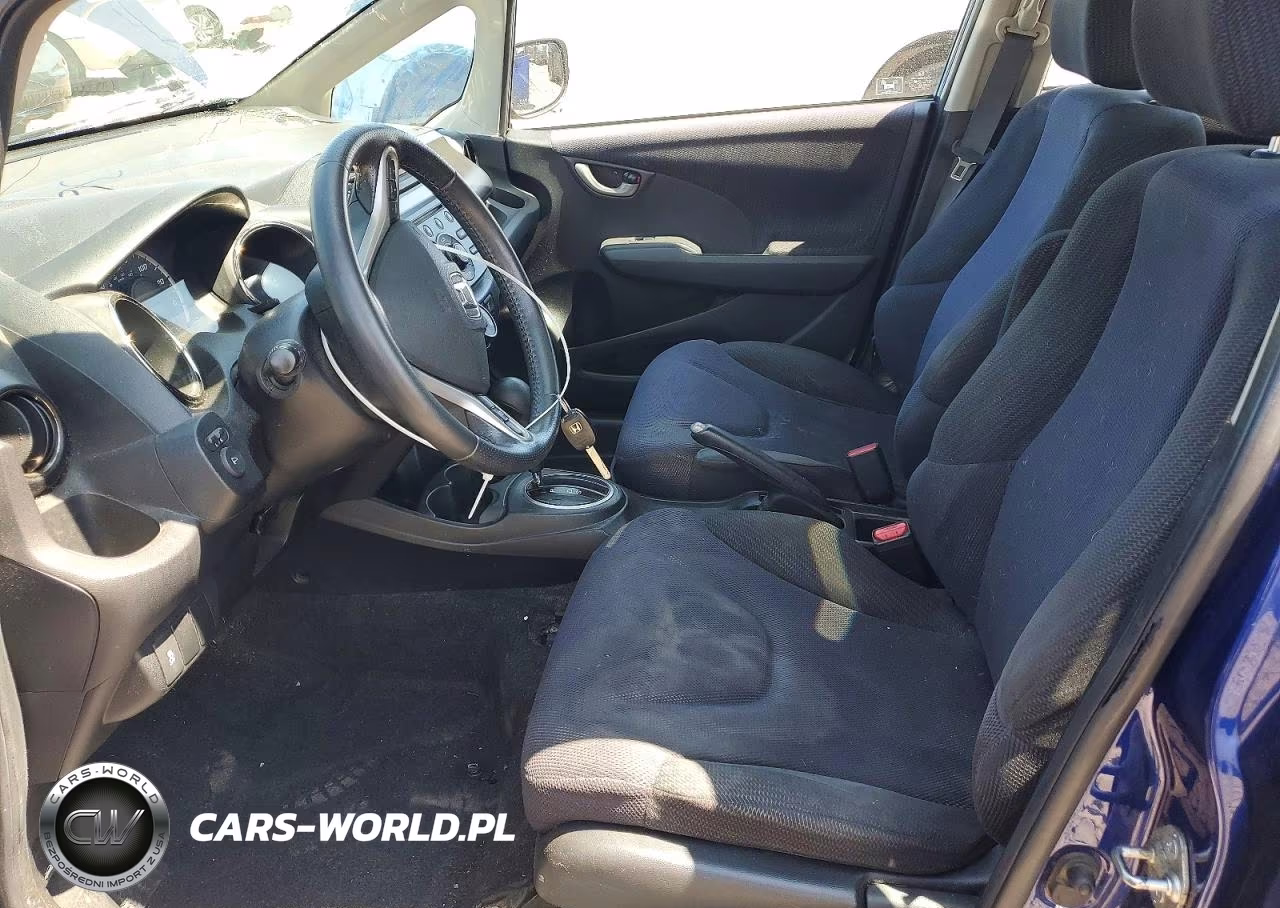 2013 Honda Fit Sport VIN:JHMGE8H55DC072653 - 7