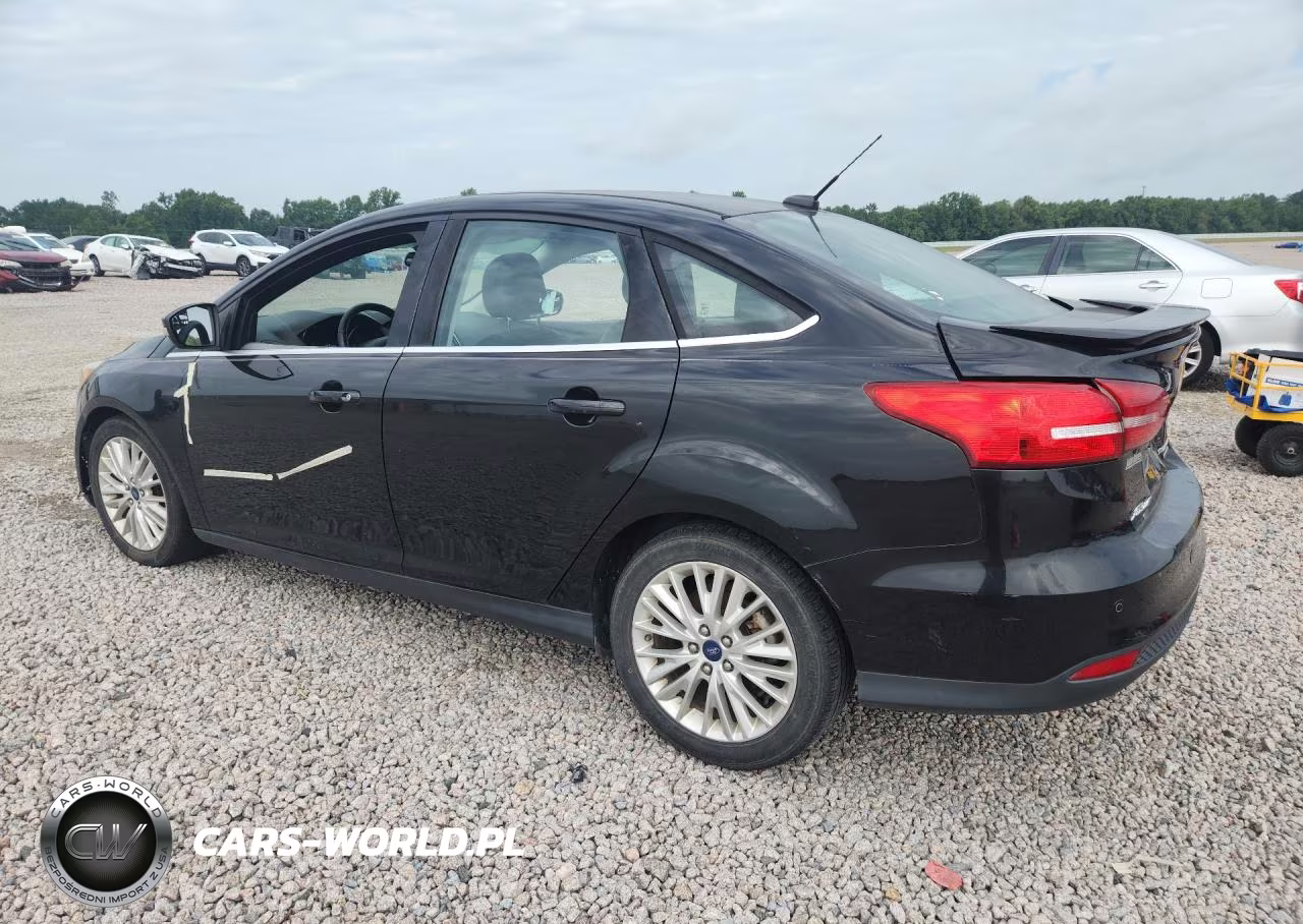 2015 Ford Focus Titanium VIN:1FADP3J25FL238230 - 2