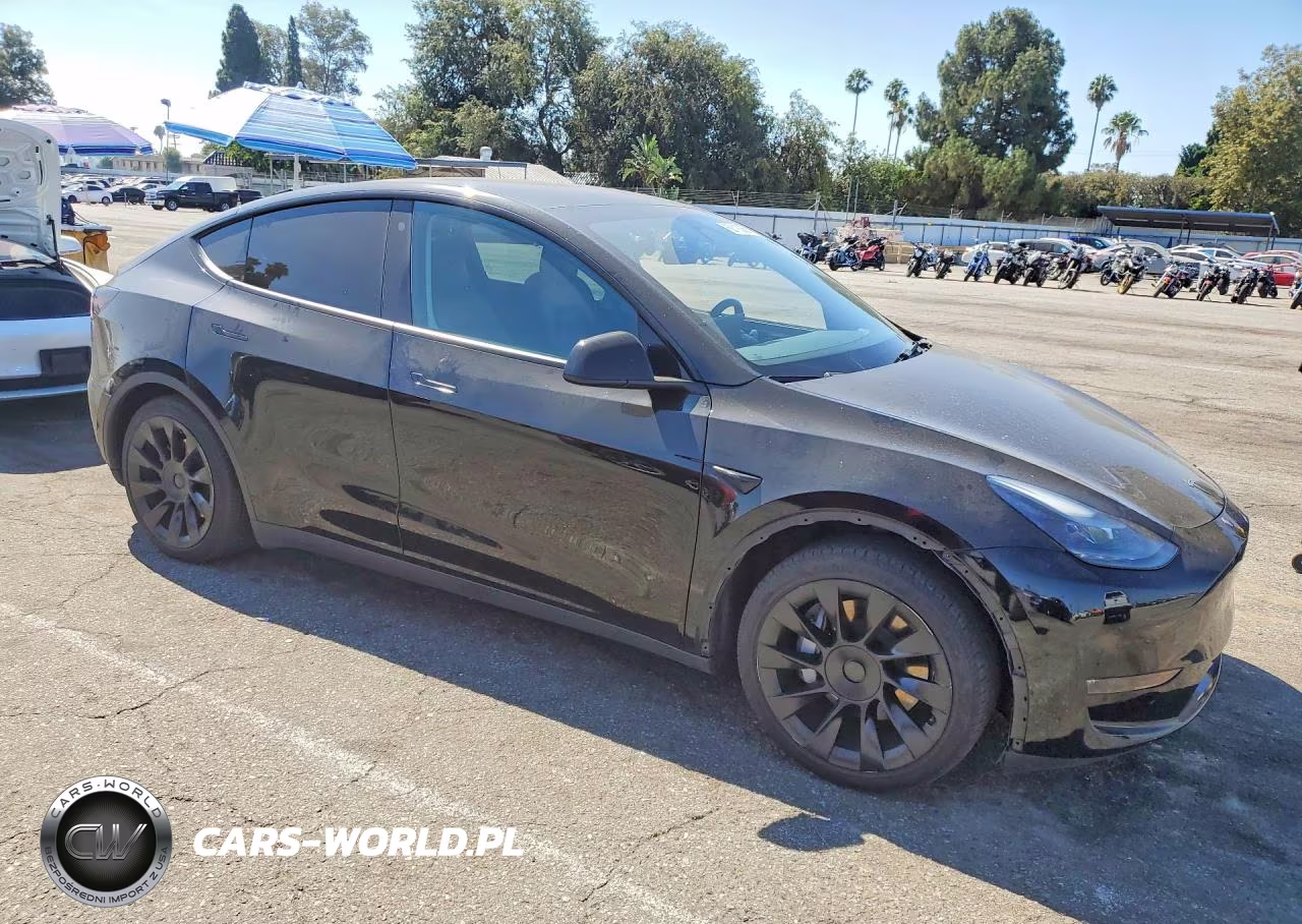 2023 Tesla Model Y VIN:7SAYGAEE0PF634853 - 4