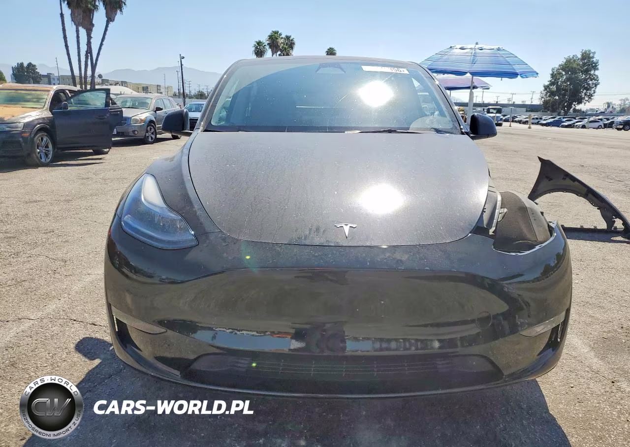 2023 Tesla Model Y VIN:7SAYGAEE0PF634853 - 5