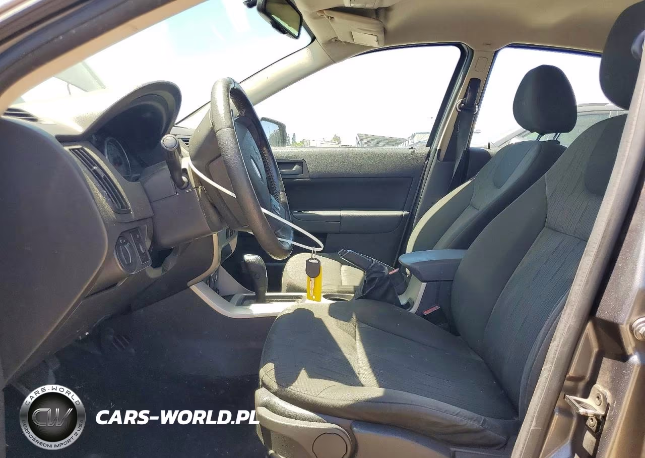 2009 Ford Focus Se VIN:1FAHP35N39W141102 - 7