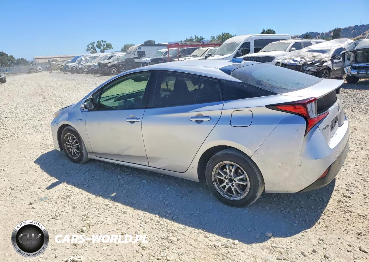 2021 Toyota Prius L Eco VIN:JTDKAMFU2M3142247 - 2