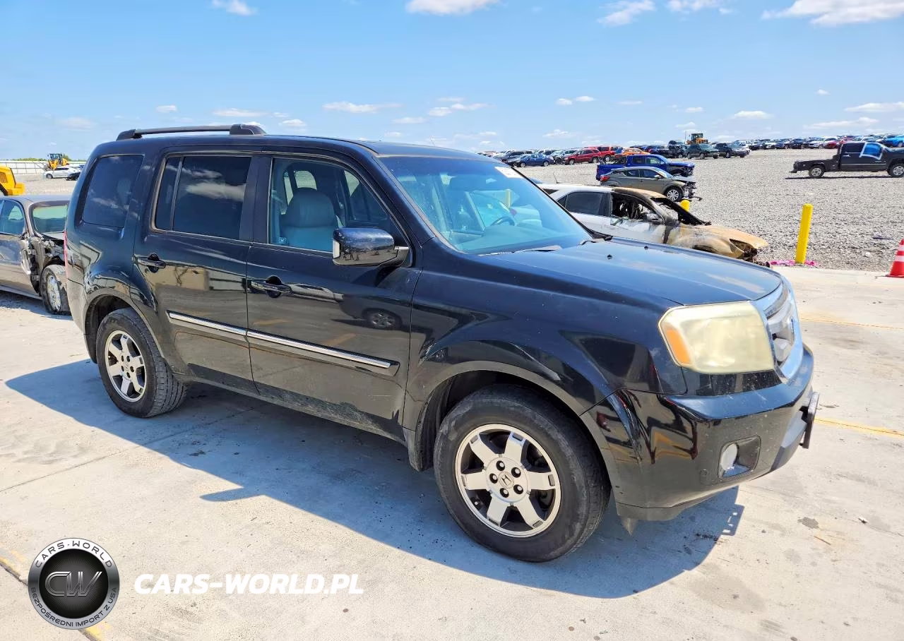 2011 Honda Pilot Touring VIN:5FNYF4H97BB101827 - 4