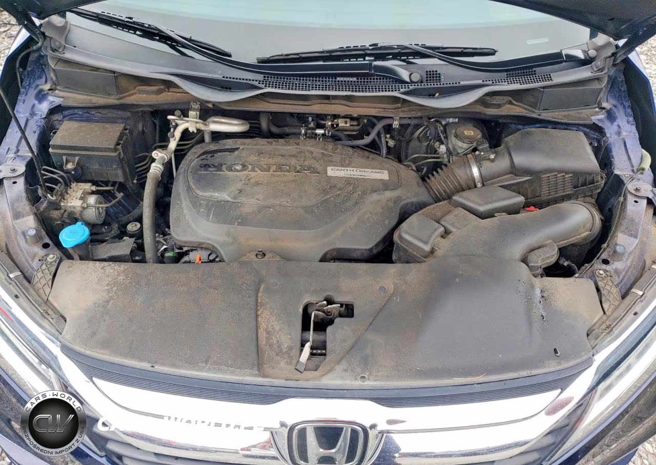 2019 Honda Odyssey Touring VIN:5FNRL6H8XKB118394 - 12