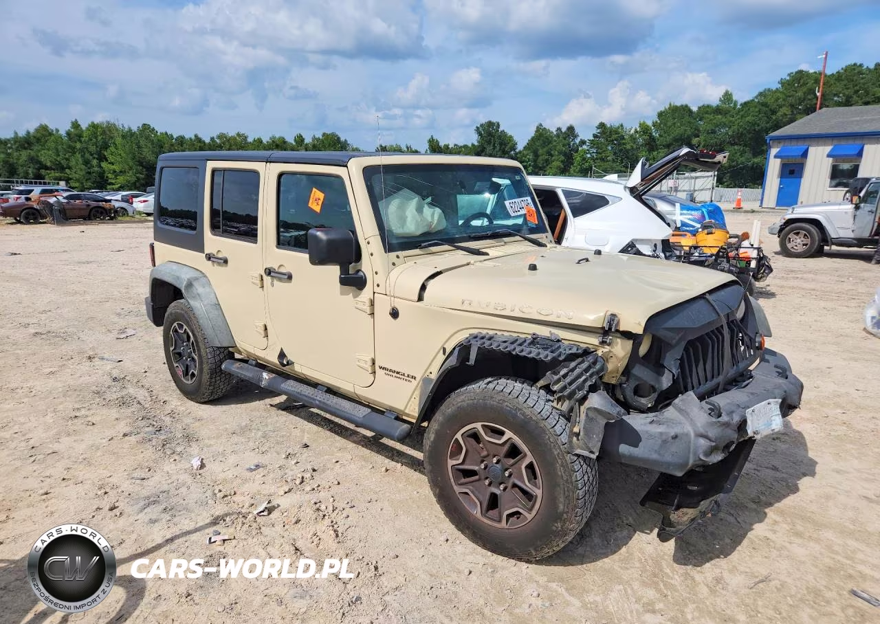 2011 Jeep Wrangler Unlimited Rubicon VIN:1J4BA6H12BL615134 - 4