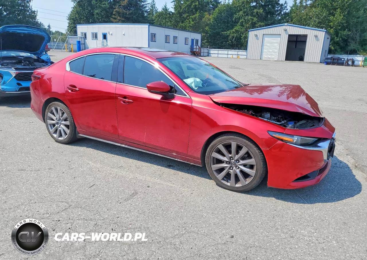 2019 Mazda 3 Premium VIN:JM1BPBEM6K1125061 - 4
