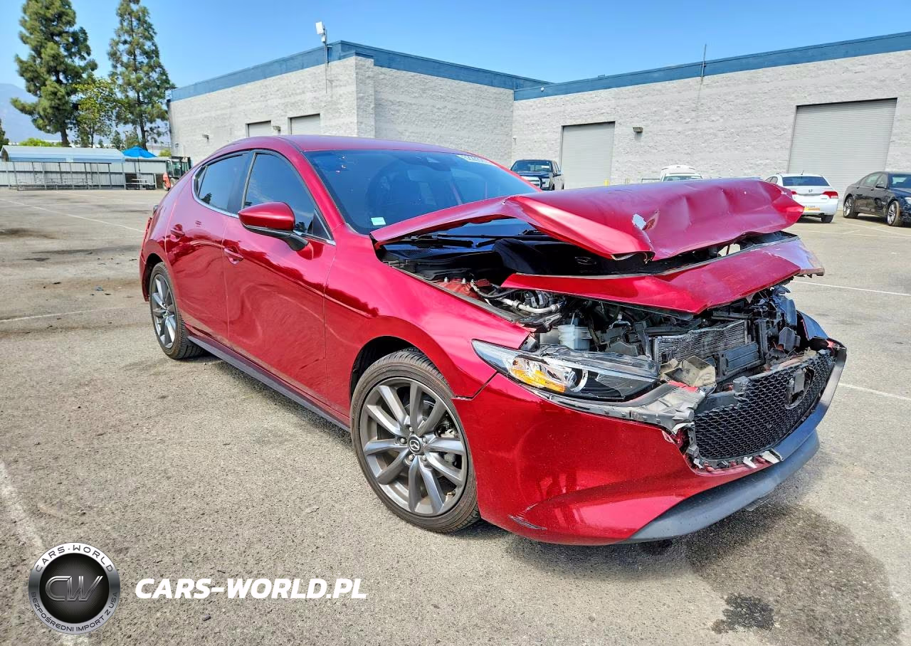 2019 Mazda 3 Preferred VIN:JM1BPAMM4K1119710 - 4
