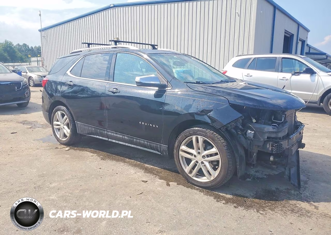 2018 Chevrolet Equinox Premier VIN:2GNAXWEX9J6137897 - 4