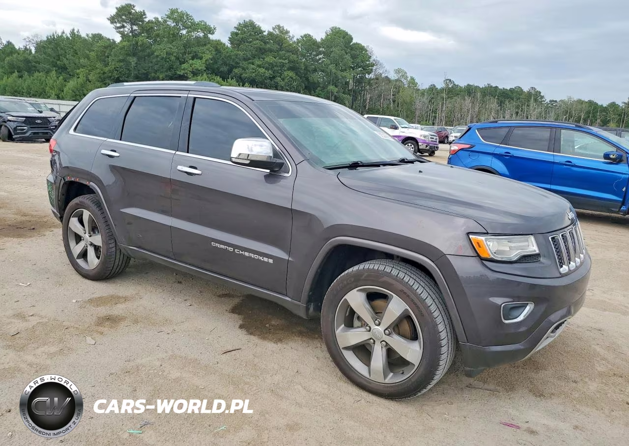 2015 Jeep Grand Cherokee Overland VIN:1C4RJECG3FC742071 - 4