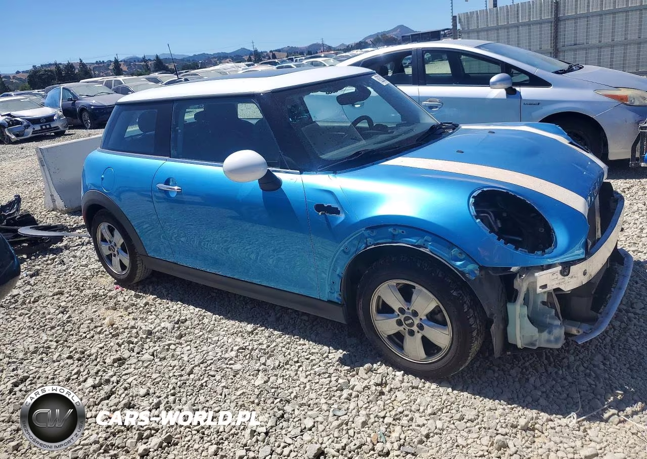 2015 Mini Cooper VIN:WMWXM5C58FT942051 - 4