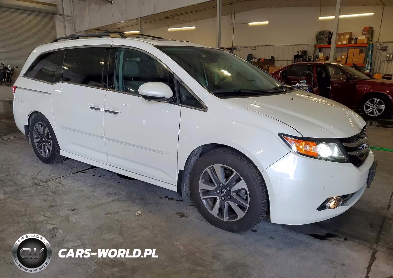 2015 Honda Odyssey Touring VIN:5FNRL5H97FB062519 - 4