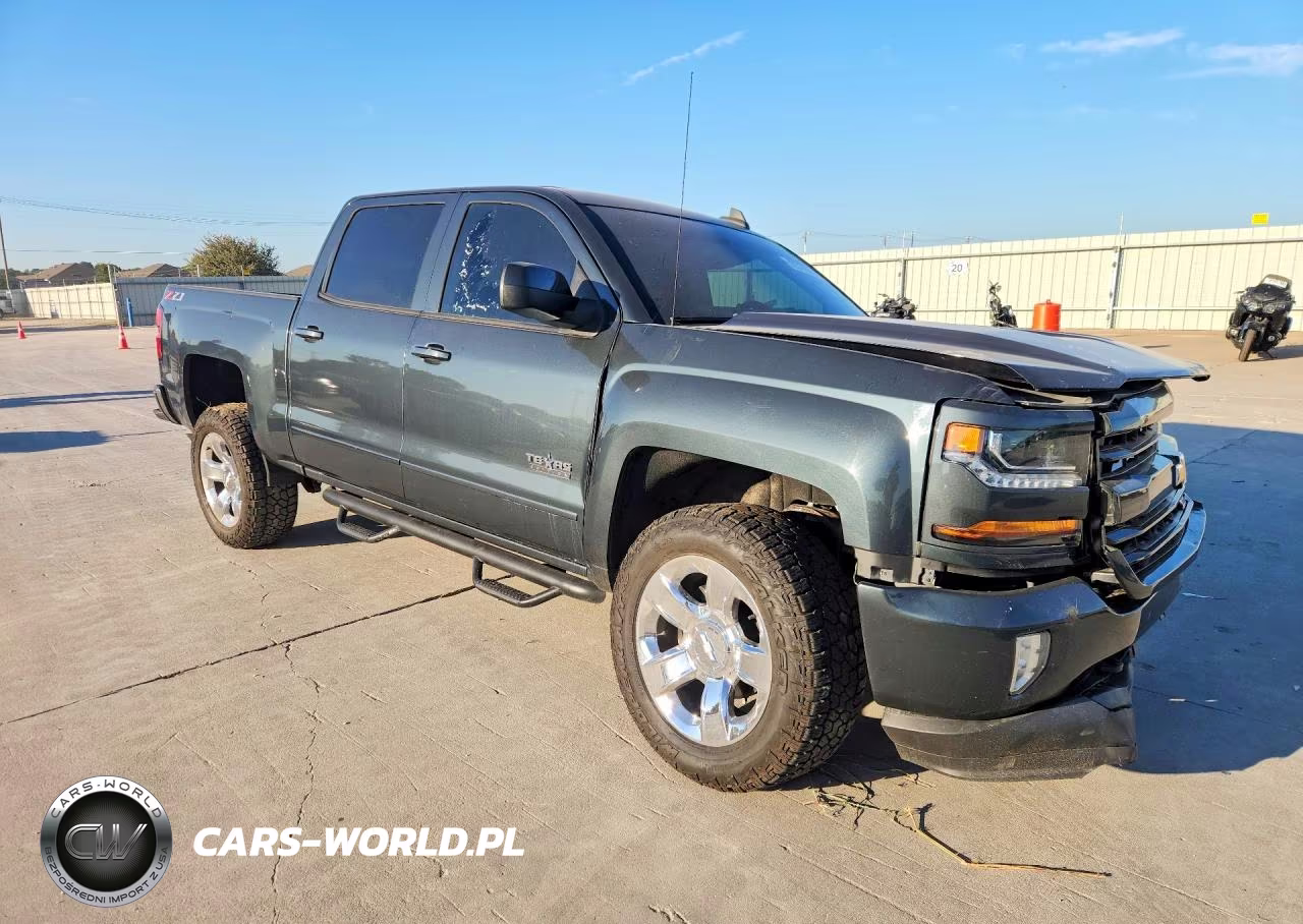 2018 Chevrolet Silverado K1500 Lt VIN:3GCUKREC1JG558665 - 4