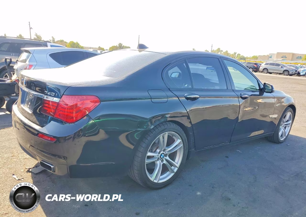 2015 BMW 740 I VIN:WBAYA6C50FGK16616 - 3