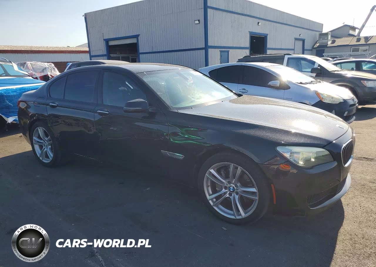 2015 BMW 740 I VIN:WBAYA6C50FGK16616 - 4