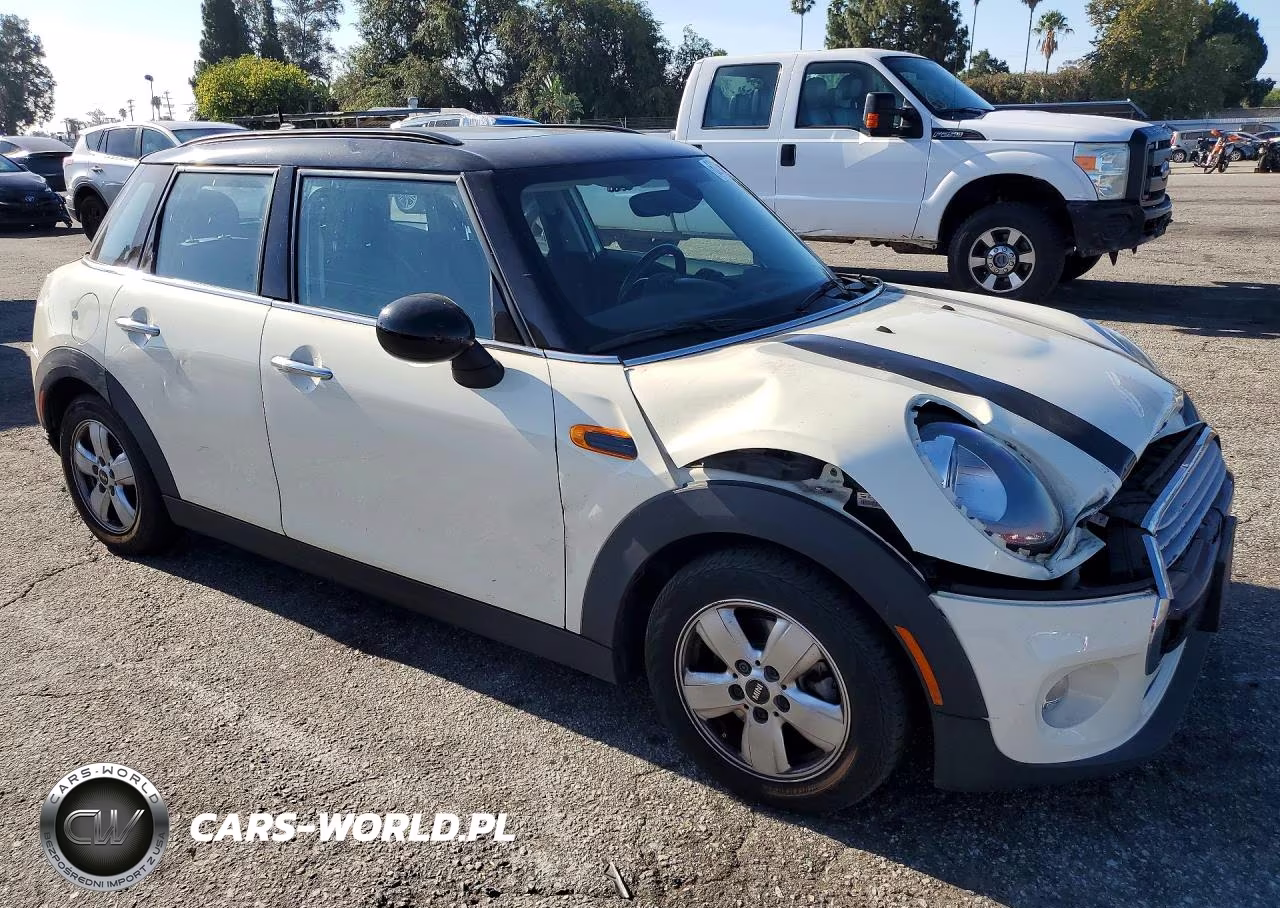 2015 Mini Cooper VIN:WMWXS5C57FT834073 - 4