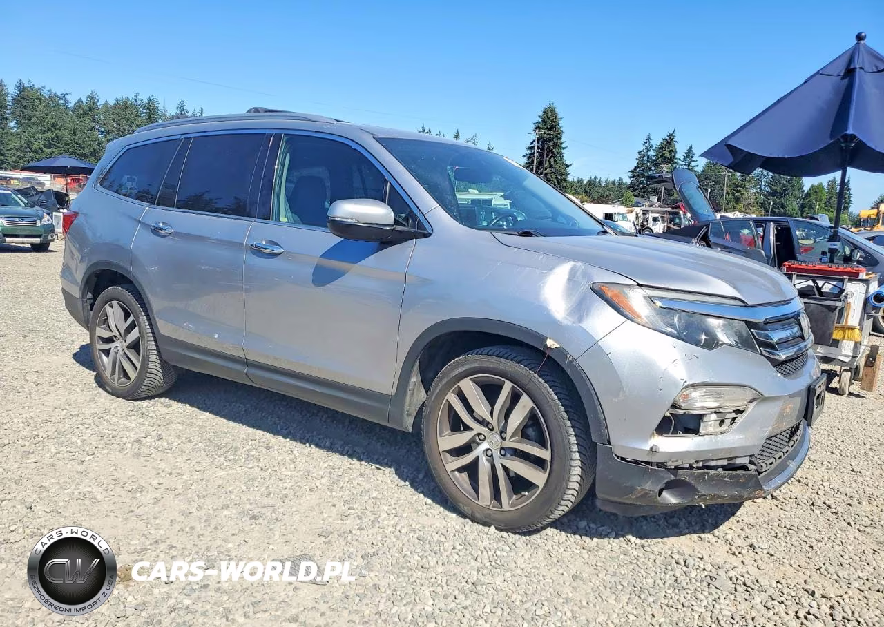 2016 Honda Pilot Elite VIN:5FNYF6H09GB123817 - 4