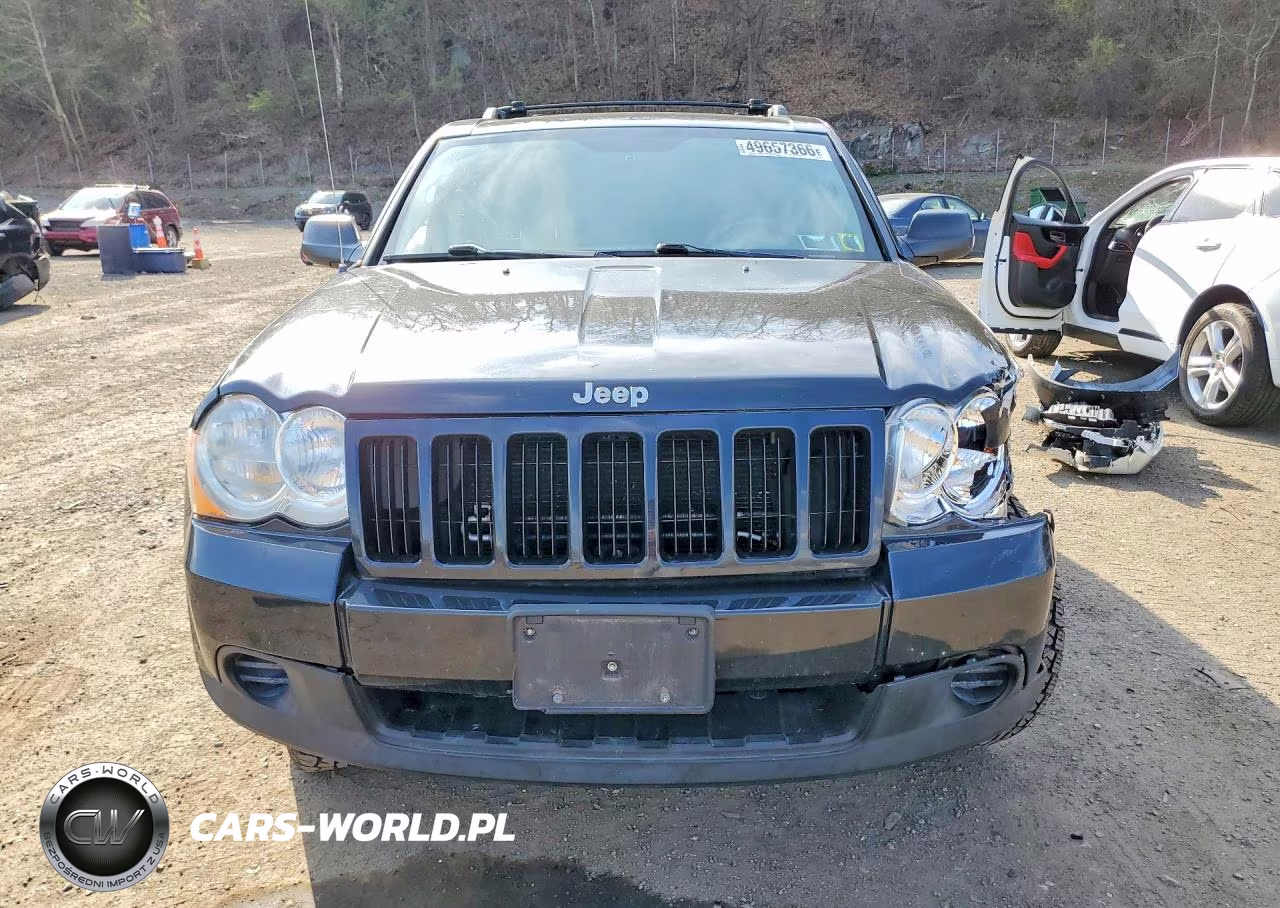 2009 Jeep Grand Cherokee Laredo VIN:1J8GR48K59C528672 - 9