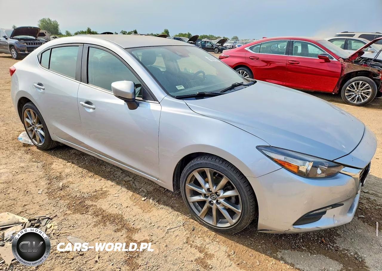 2018 Mazda 3 Touring VIN:3MZBN1V36JM209810 - 4