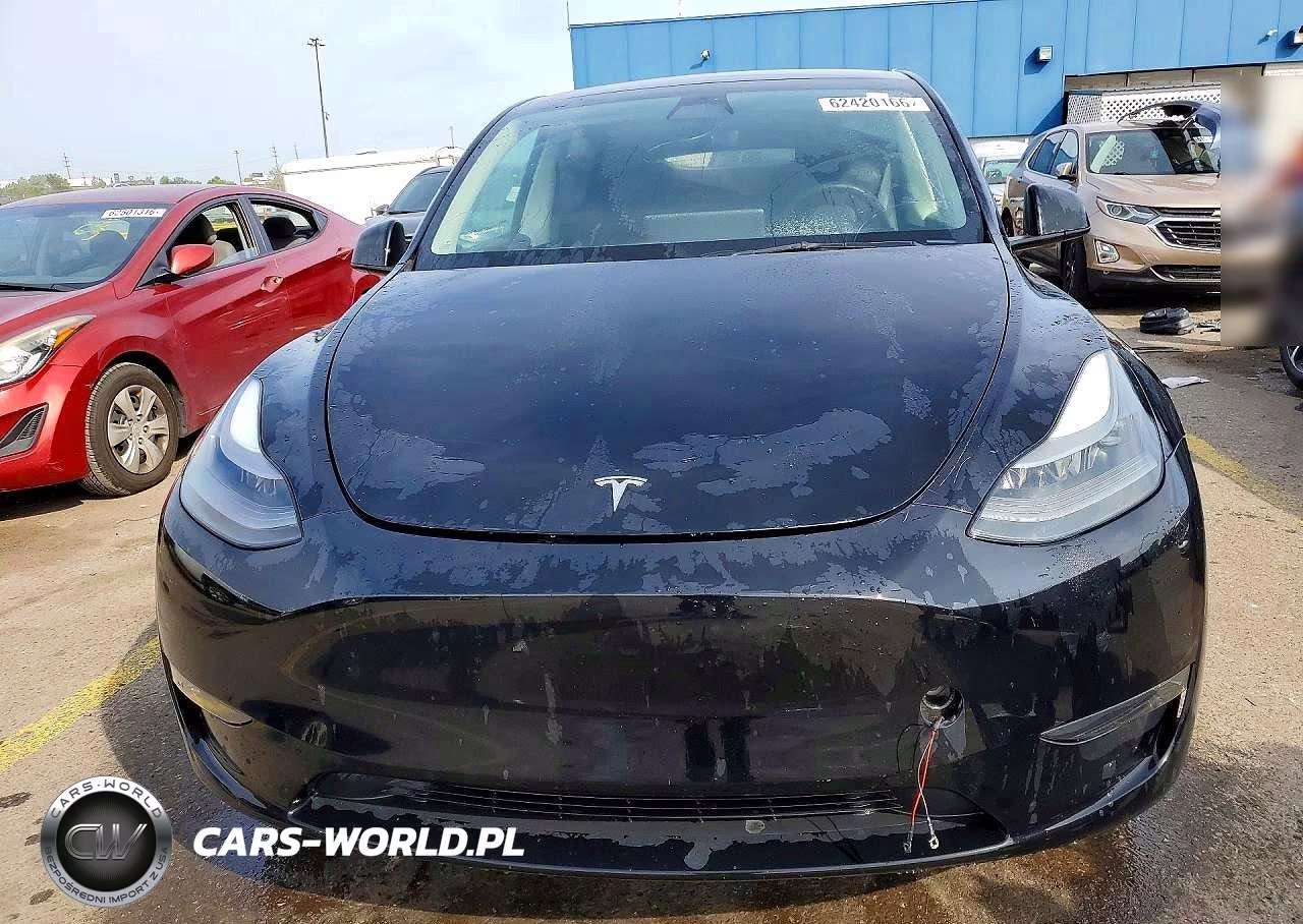 2023 Tesla Model Y VIN:7SAYGDEE3PF663300 - 5