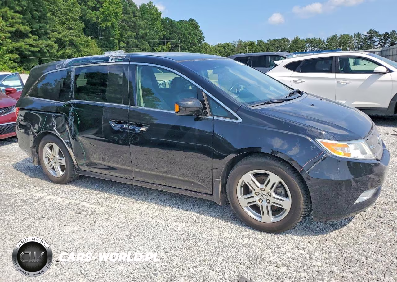2011 Honda Odyssey Touring VIN:5FNRL5H98BB092915 - 4