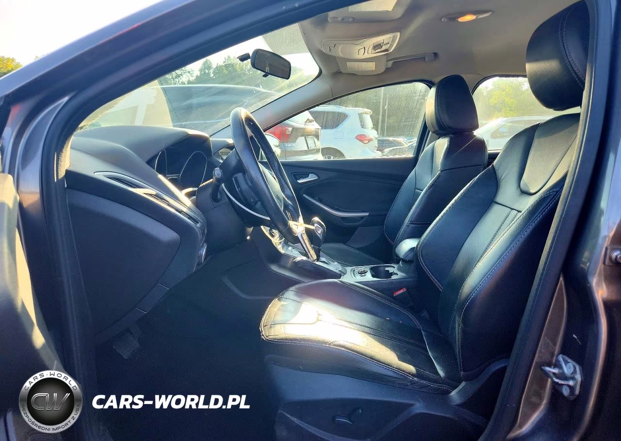 2014 Ford Focus Titanium VIN:1FADP3J2XEL462916 - 7