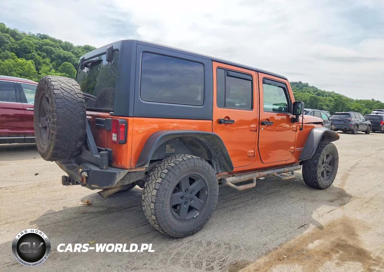 2011 Jeep Wrangler Unlimited Rubicon VIN:1J4HA6H11BL641539 - 3