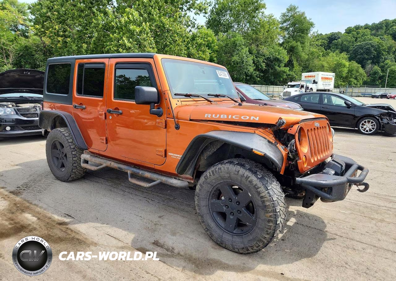 2011 Jeep Wrangler Unlimited Rubicon VIN:1J4HA6H11BL641539 - 4