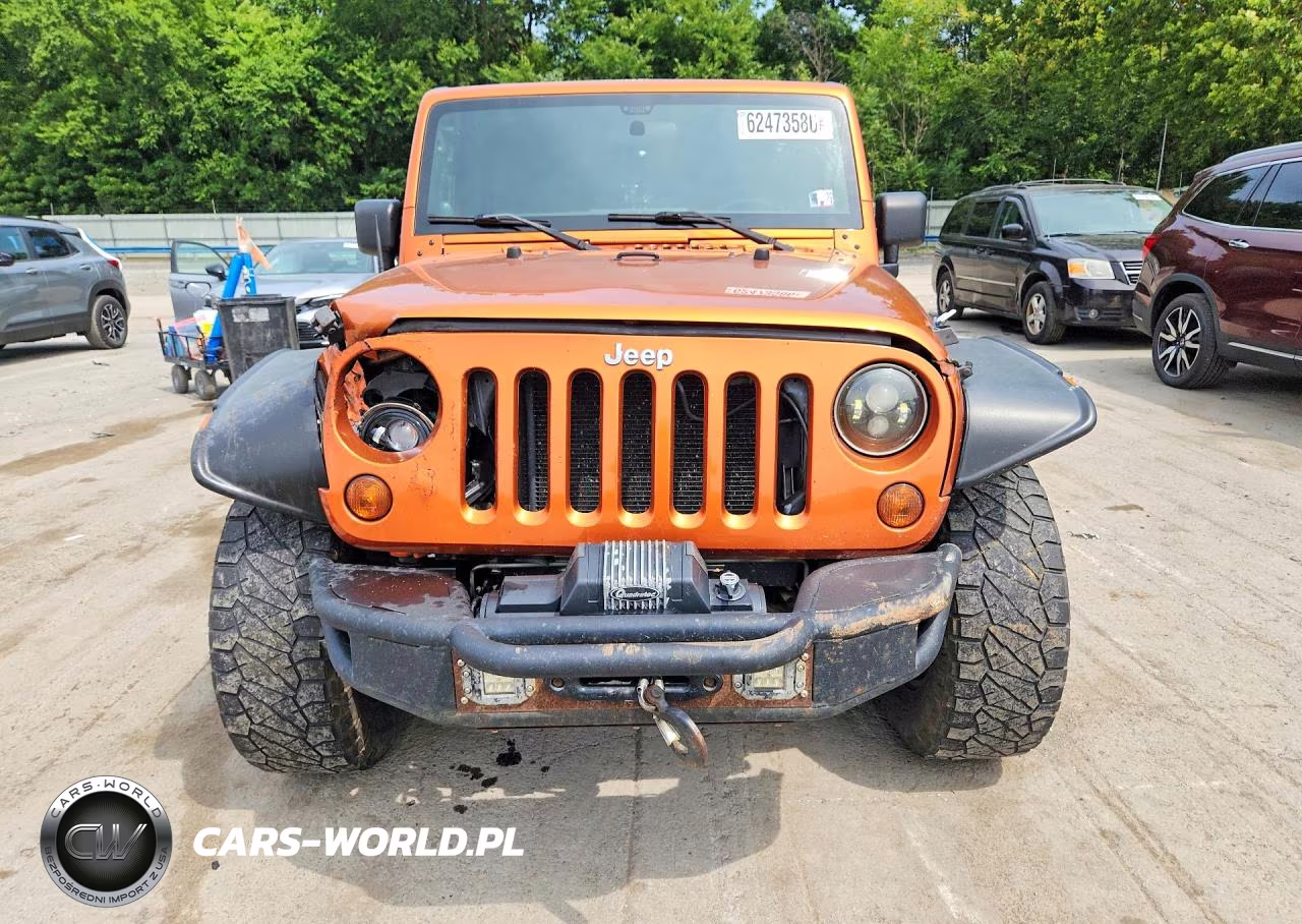2011 Jeep Wrangler Unlimited Rubicon VIN:1J4HA6H11BL641539 - 5