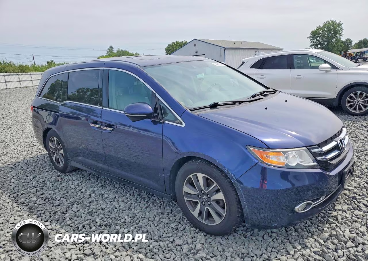 2014 Honda Odyssey Touring VIN:5FNRL5H96EB088740 - 4