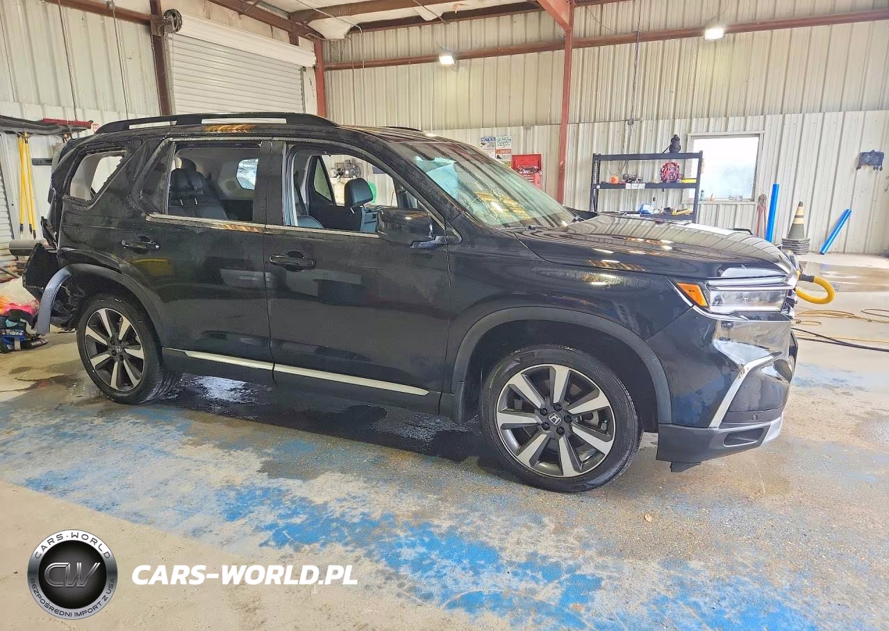 2025 Honda Pilot Touring VIN:5FNYG1H7XSB008732 - 4