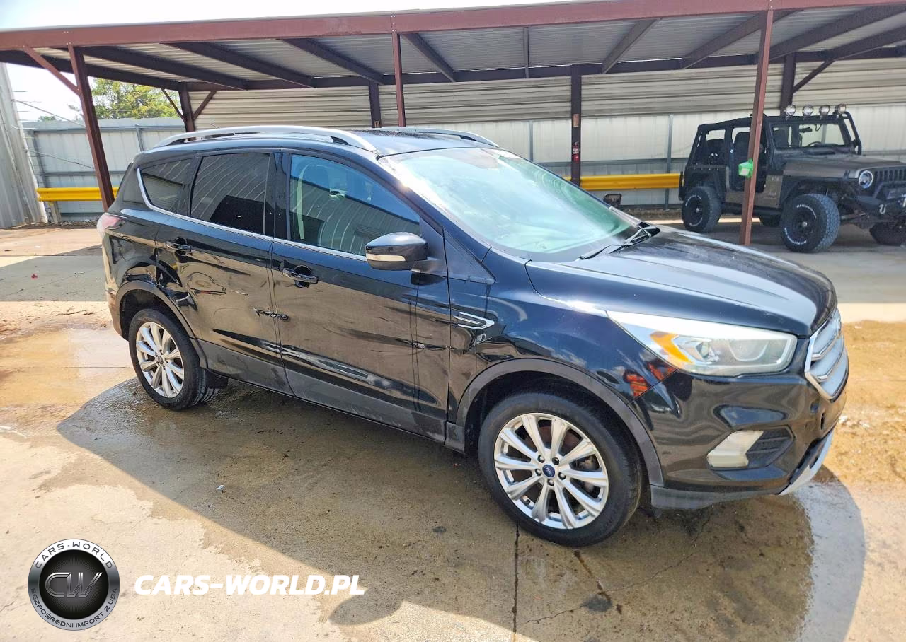 2017 Ford Escape Titanium VIN:1FMCU0J91HUA63400 - 4