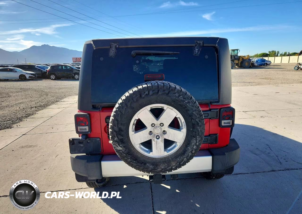 2011 Jeep Wrangler Unlimited Sahara VIN:1J4HA5H1XBL534497 - 6