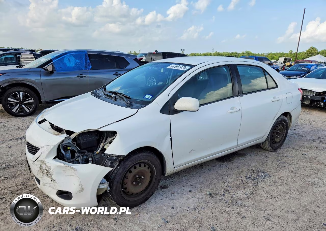 2009 Toyota Yaris Base VIN:JTDBT903491345182 - 1