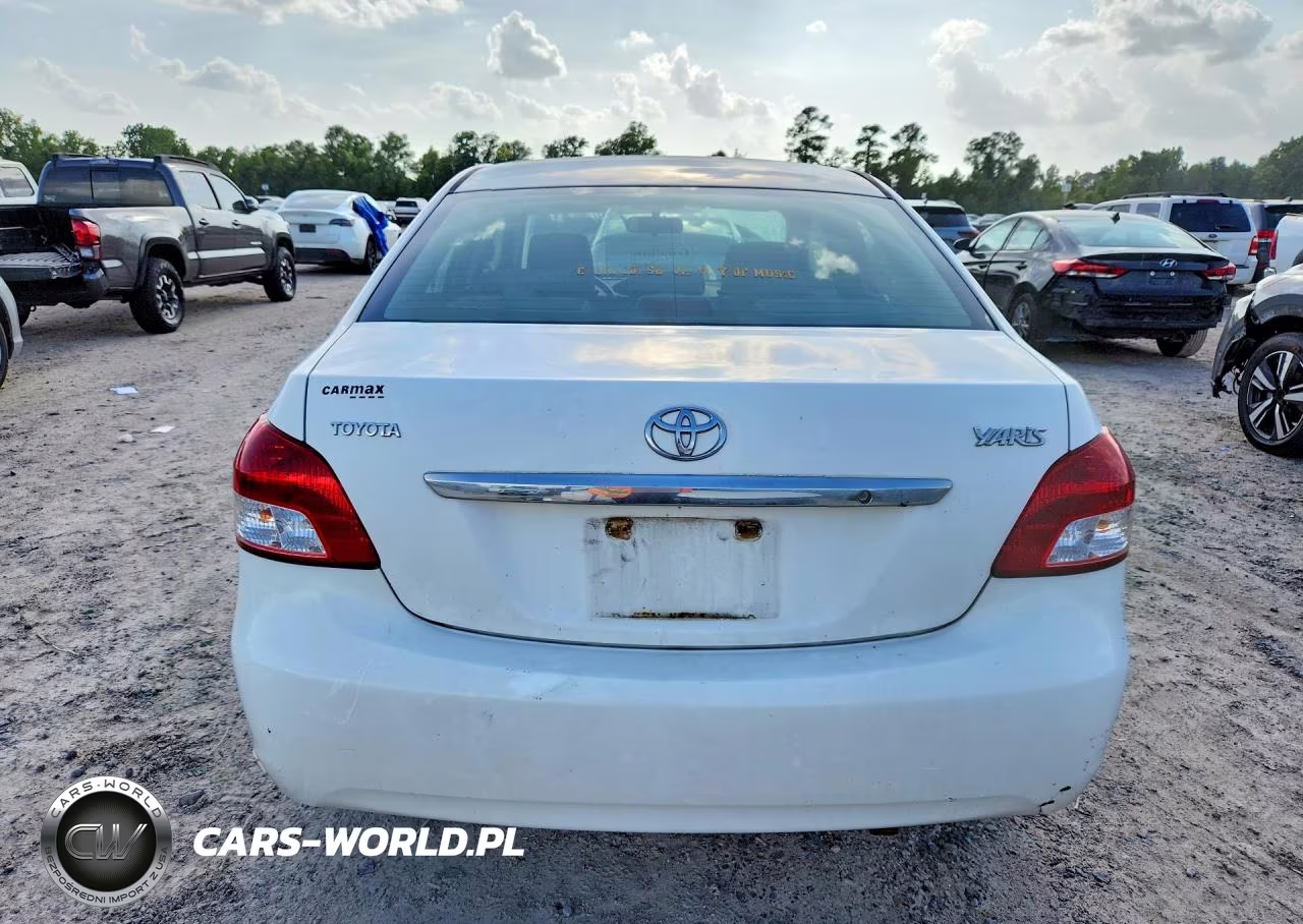 2009 Toyota Yaris Base VIN:JTDBT903491345182 - 6