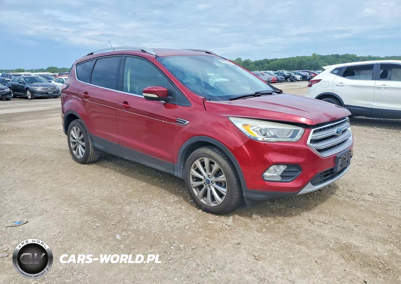 2017 Ford Escape Titanium VIN:1FMCU0J90HUA32073 - 4