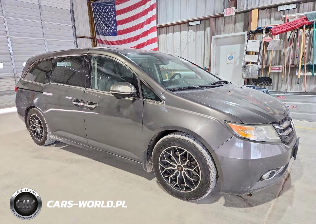 2014 Honda Odyssey Touring VIN:5FNRL5H96EB018459 - 4