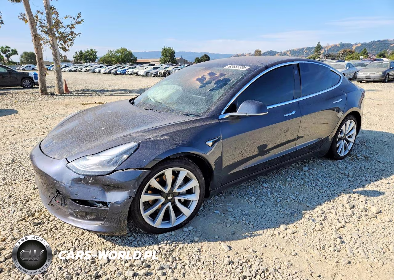2018 Tesla Model 3 VIN:5YJ3E1EB9JF185070 - 1