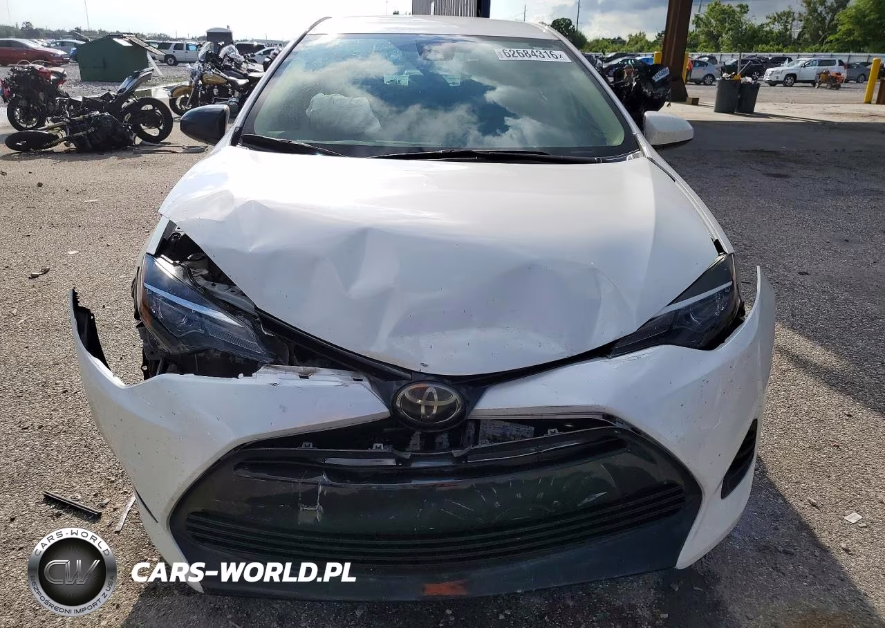 2018 Toyota Corolla Le VIN:5YFBURHE0JP779506 - 5