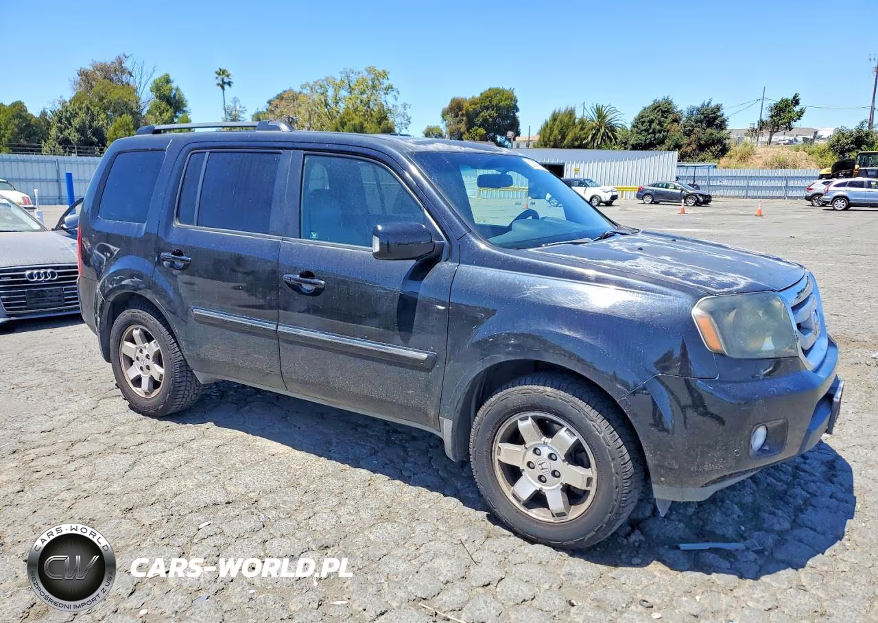 2010 Honda Pilot Touring VIN:5FNYF4H97AB005372 - 4