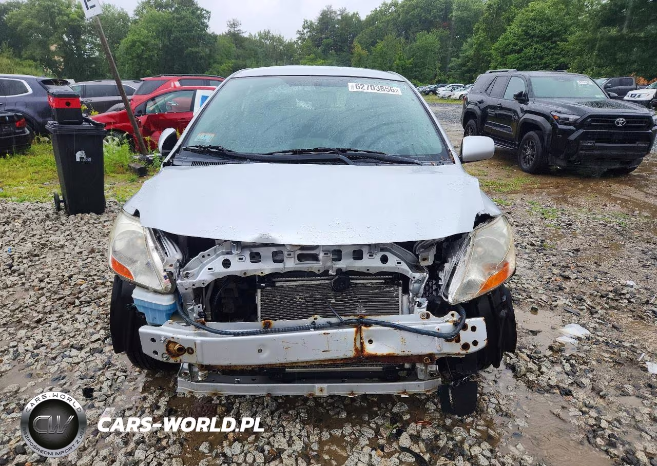 2011 Toyota Yaris Base VIN:JTDBT4K32B1399408 - 5